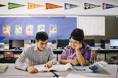 man and woman studying